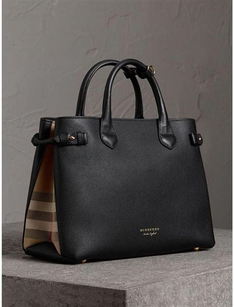 saks burberry totes.